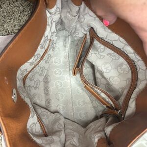 Michael Kors brown leather purse with duster bag
